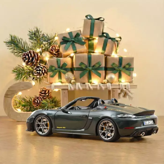 porsche-718-spyder-rs-pack-weissach-2023-forestgreenmetallic-1-18 (2).webp